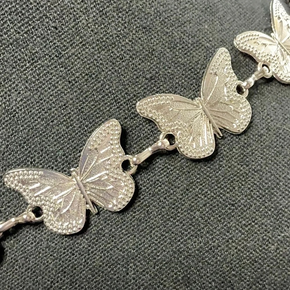 Elegant Silver Butterfly Concho Belt